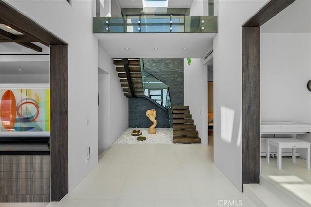 2935 Vista Del Mar, Rancho Palos Verdes, CA 90275 - staircase featuring tile patterned flooring and a high ceiling