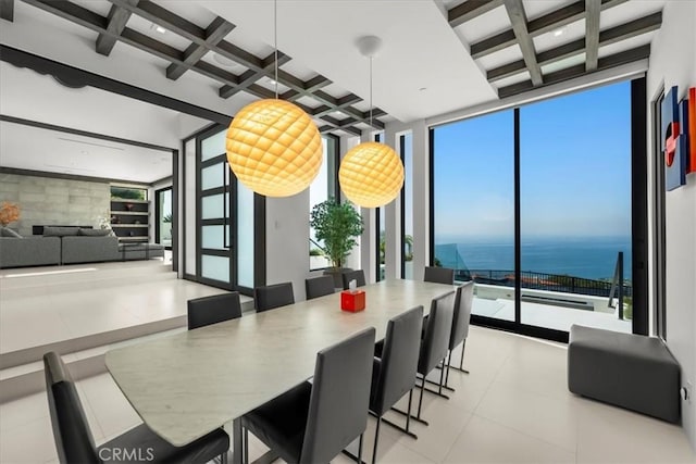 2935 Vista Del Mar, Rancho Palos Verdes, CA 90275 - tiled dining room featuring coffered ceiling, floor to ceiling windows, beamed ceiling, and a water view