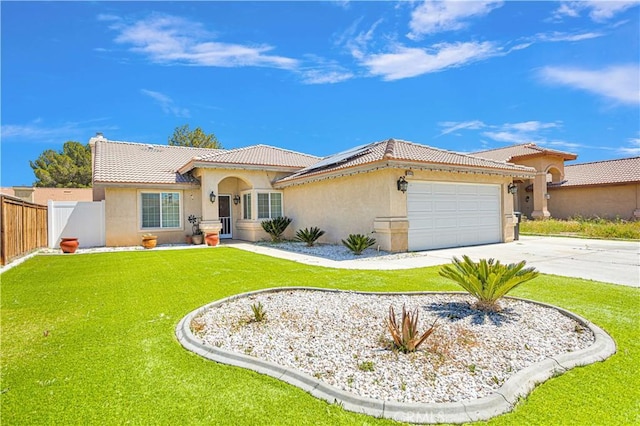 mediterranean / spanish-style home with a front lawn and a garage