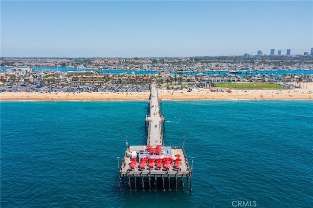 aerial view featuring a view of the beach and a water view