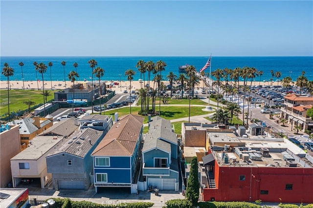 aerial view featuring a water view and a beach view