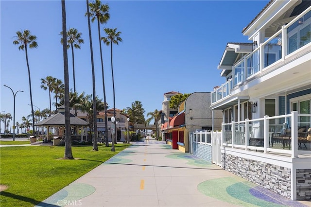 view of home's community with a gazebo and a yard