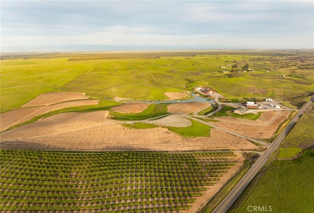 birds eye view of property featuring a rural view