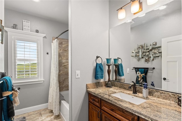 bathroom with vanity and shower / bath combo