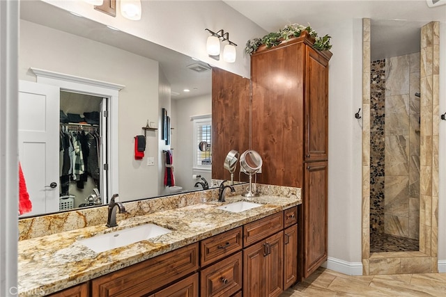 bathroom featuring a shower with door, hardwood / wood-style floors, and vanity