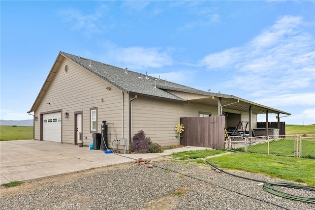 view of home's exterior featuring a lawn