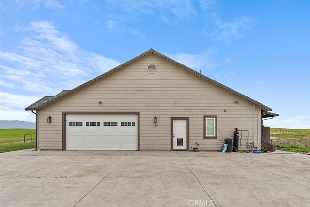 exterior space with a garage