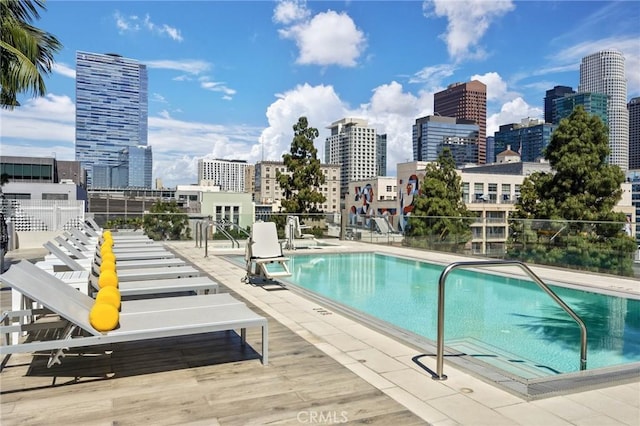 view of swimming pool featuring a patio