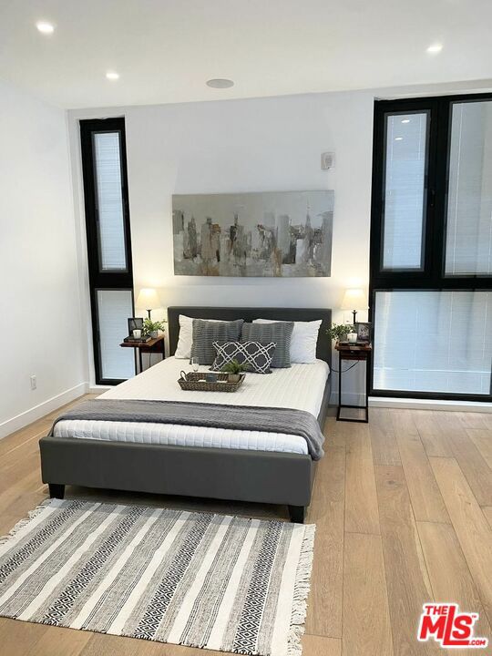 bedroom featuring light hardwood / wood-style flooring