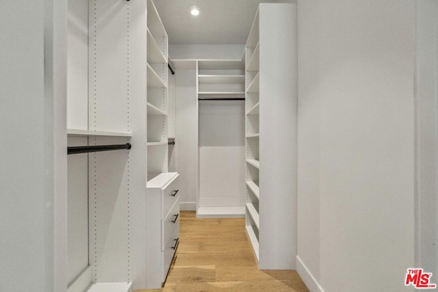 bedroom with light hardwood / wood-style floors