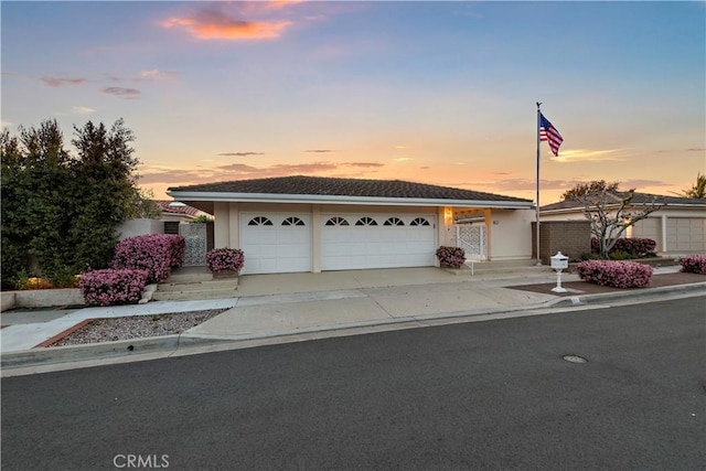 view of front of house with a garage