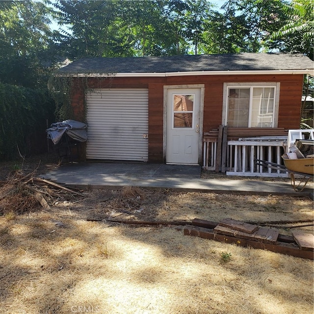 view of outbuilding featuring a garage