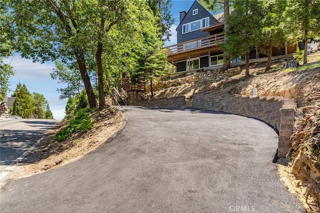 exterior space featuring a wooden deck