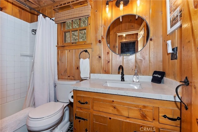 full bathroom featuring wood walls, vanity, shower / tub combo, and toilet