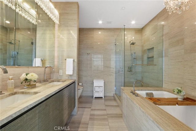 full bathroom featuring a notable chandelier, toilet, tile walls, and plus walk in shower