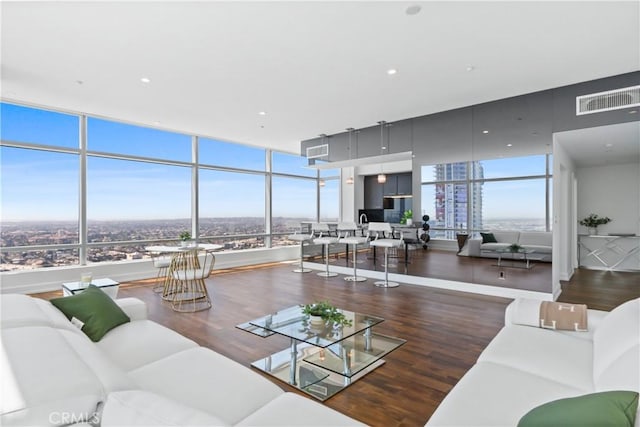 900 W Olympic Blvd Unit 42A, Los Angeles, CA 90015 - living room featuring wood finished floors, healthy amount of natural light, and recessed lighting