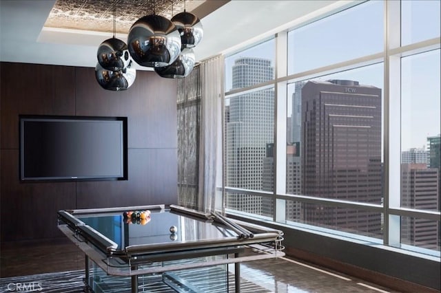 900 W Olympic Blvd Unit 42A, Los Angeles, CA 90015 - playroom with wood finished floors and wooden walls