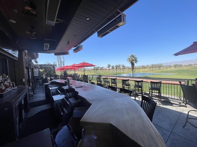 view of patio / terrace featuring ceiling fan