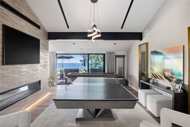 44 Sea Cove Dr, Rancho Palos Verdes, CA 90275 - rec room with wood finished floors and a large fireplace