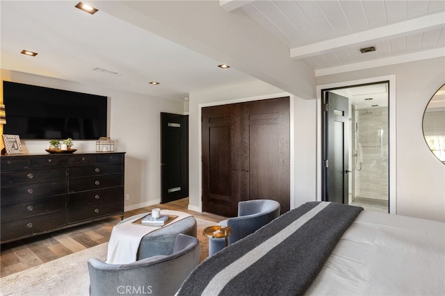 44 Sea Cove Dr, Rancho Palos Verdes, CA 90275 - bedroom featuring light wood finished floors, beamed ceiling, a closet, ensuite bathroom, and baseboards