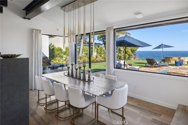 44 Sea Cove Dr, Rancho Palos Verdes, CA 90275 - dining area featuring wood finished floors, a water view, and baseboards
