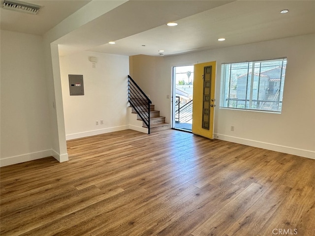 unfurnished room featuring hardwood / wood-style floors