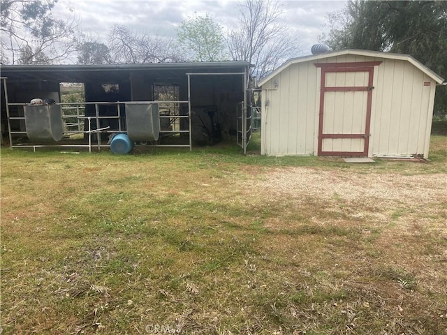 view of outdoor structure with a yard