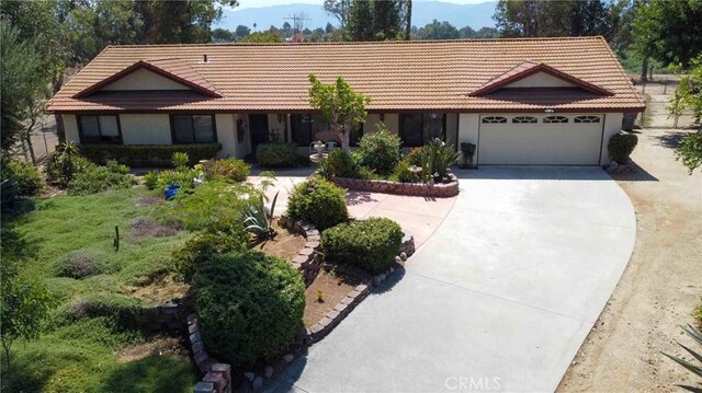 ranch-style home with a garage