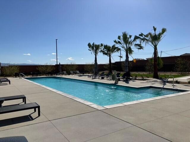 view of swimming pool featuring a patio