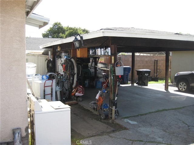 view of parking / parking lot featuring separate washer and dryer