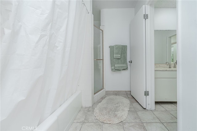 bathroom featuring vanity and tile flooring