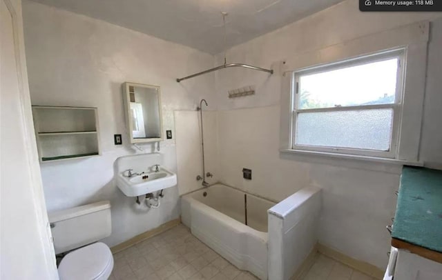 bathroom featuring toilet and bathing tub / shower combination