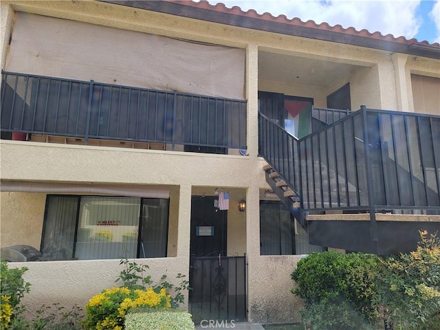 doorway to property with a balcony