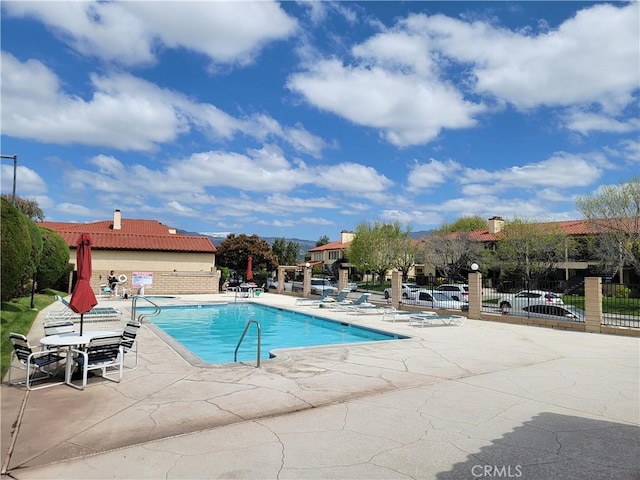 view of pool featuring a patio