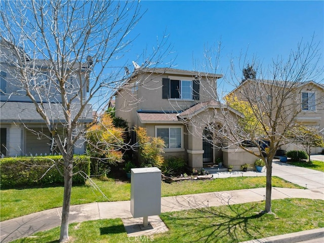 view of front of house with a front lawn and central air condition unit