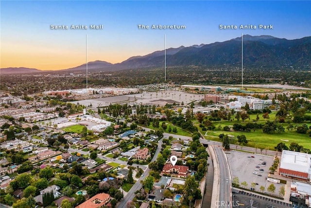 aerial view at dusk with a mountain view