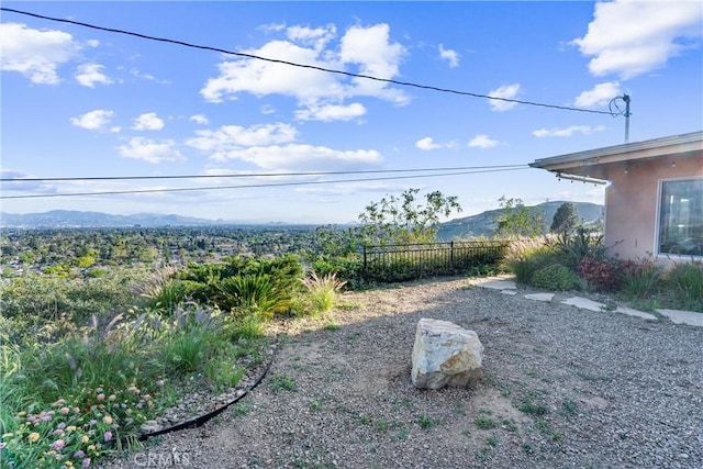 view of yard with a mountain view