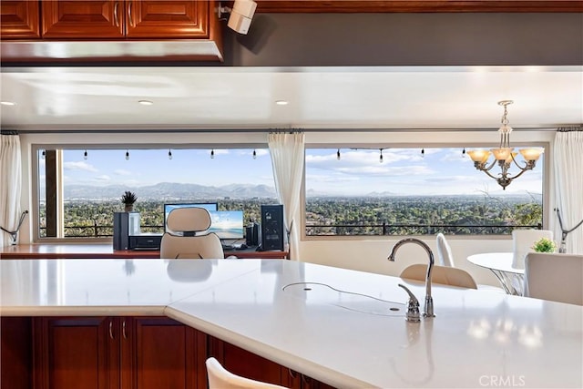 kitchen featuring a chandelier and decorative light fixtures