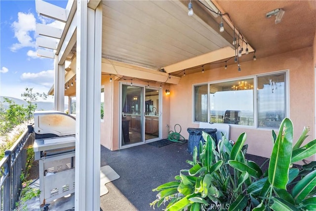 view of patio / terrace with a balcony