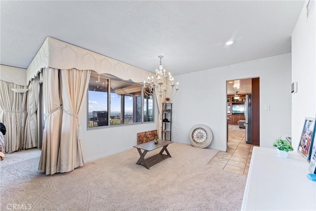 living area with carpet floors and a chandelier