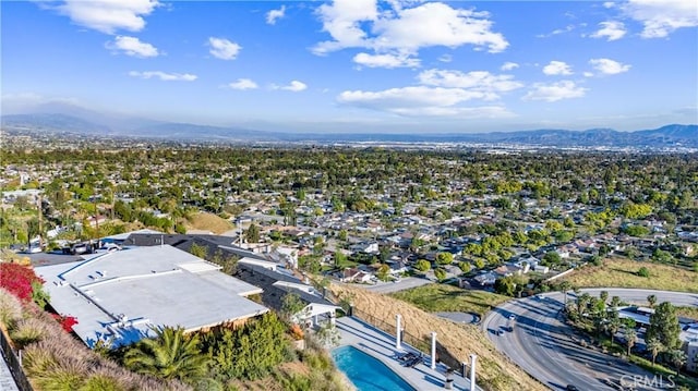 drone / aerial view featuring a mountain view