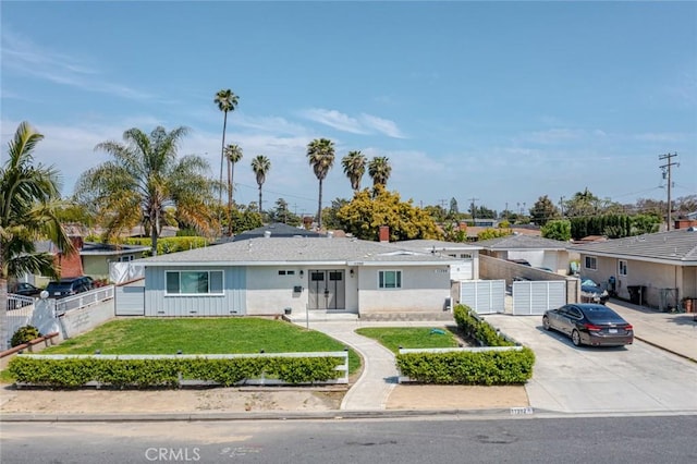 single story home with a front yard