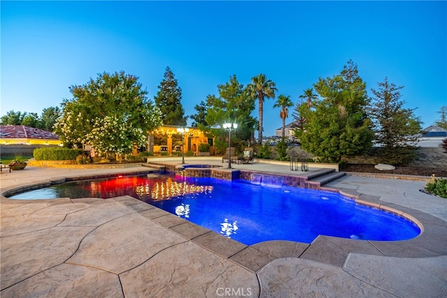 view of pool featuring a patio area