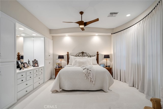 carpeted bedroom with ceiling fan