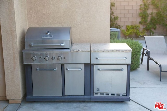 view of terrace featuring area for grilling