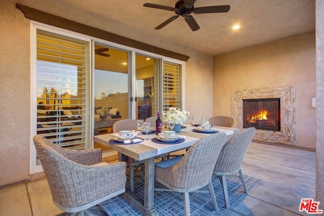 view of patio featuring ceiling fan