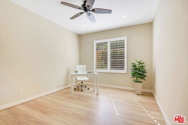 unfurnished room with light hardwood / wood-style flooring and ceiling fan