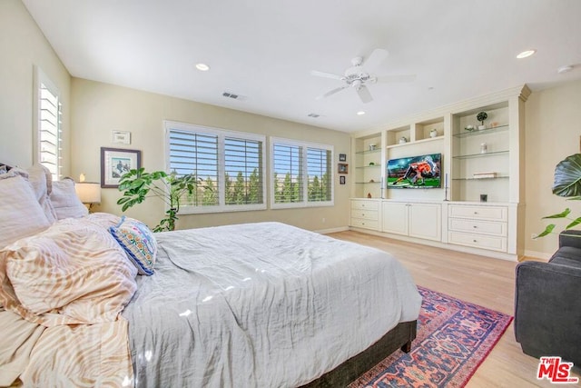 bedroom featuring ceiling fan and light wood-type flooring