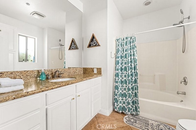 full bathroom featuring toilet, vanity, shower / tub combo with curtain, and tile patterned flooring