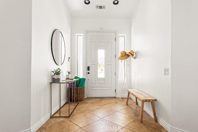 view of tiled foyer entrance